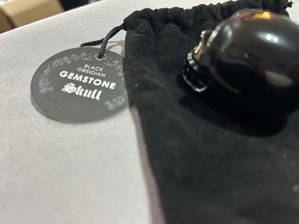 Black Obsidian gemstone skull Evoke Feelings of purification.protection.Healing