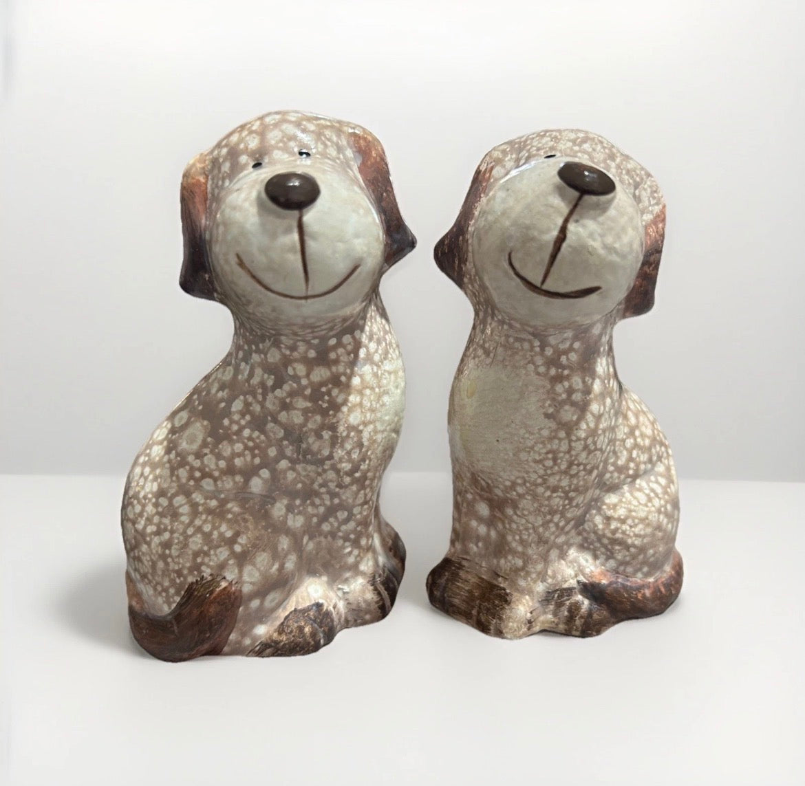 Portland Pair Of Cute Sitting Dogs