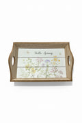 Wooden tray with floral design and 'Hello Spring' text on a white background